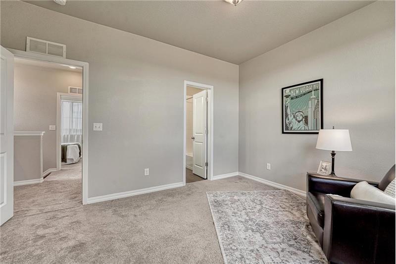 View into the hallway from upper level Bedroom #2.