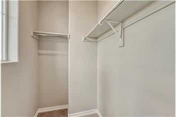 Walk in closet in upper level Bedroom #2.