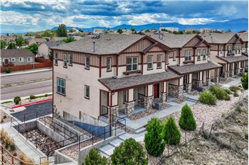 Aerial front view of building that has wildlife and open space views.
