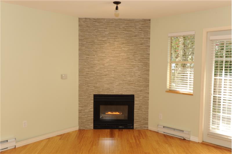 Gas Fireplace has Tiled Wall