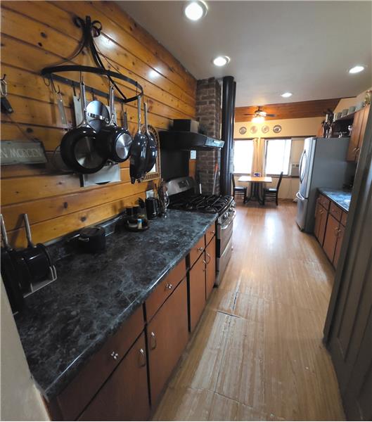 There is a utility Closet in the kitchen area with the washer & Dryer.