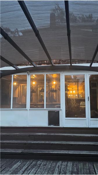 Close up of Sunroom in back of house.