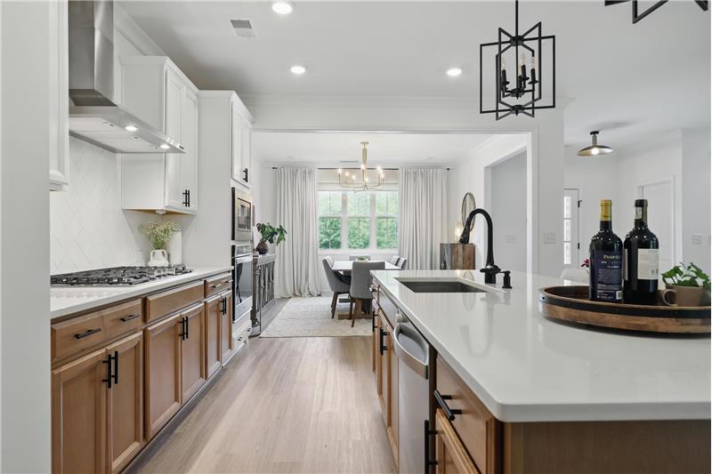 Upgraded gas cooktop, hood and touchless convection oven