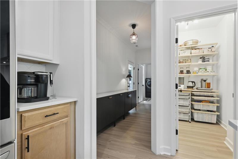 Walk in pantry with Elfa shelving 