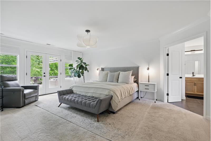 Primary Suite with Double Doors leading to Deck