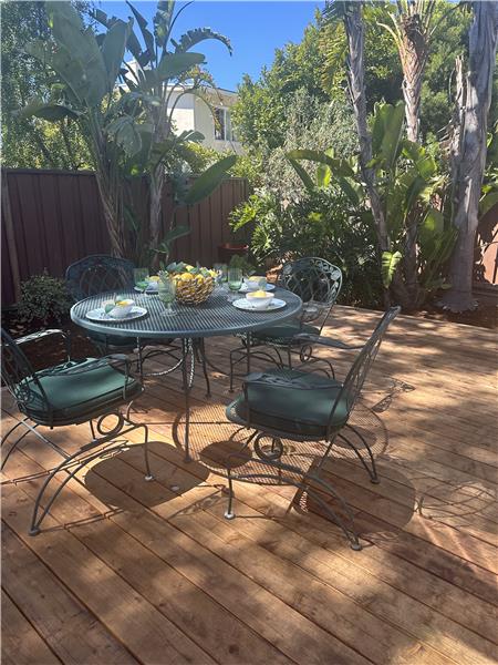 New back deck, mature birds of paradise