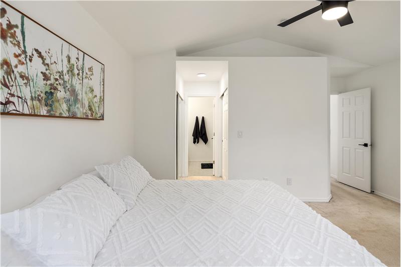 Primary Bedroom with view into en-suite bath