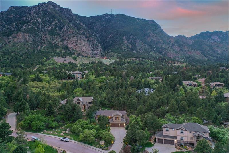Aerial View of Home from the Ro1ad with Cheyenne Mtn Views