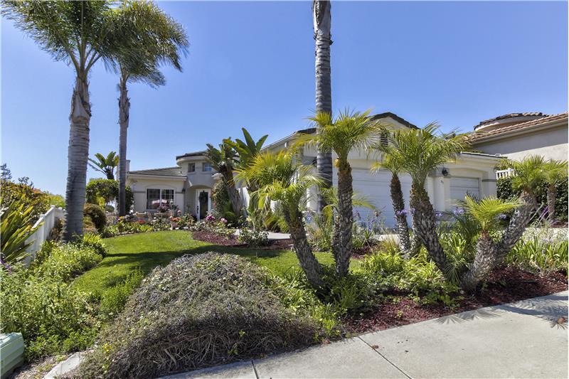 Picturesque in every way, the 6,534 sq ft lot is brimming with Mediterranean Charm!