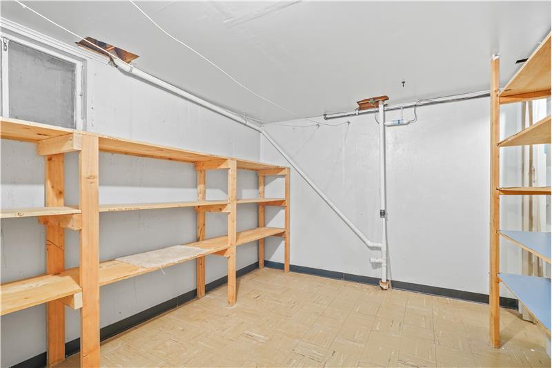 Storage room accessed through laundry room