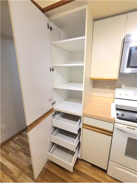 Pantry Cupboard with pullout pot/pan drawers underneath
