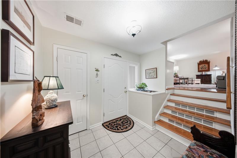 Foyer going up to living room