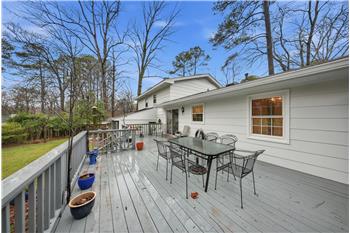 Deck overlooking lovely backyard