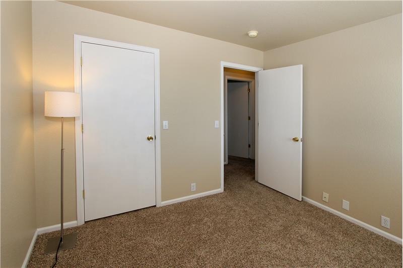 Bedroom 3 with a walk-in closet
