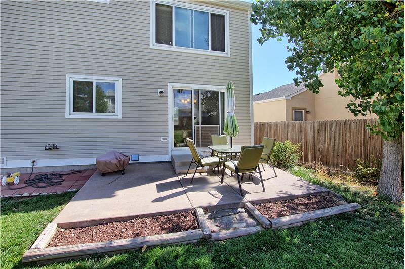 10 x 15 back patio with nice garden beds in front