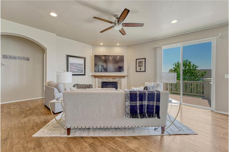 The Living Room has a slider to the backyard deck, ideal for outdoor dining and relaxation.
