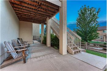 Partial covered back patio located off the basement family/rec room.