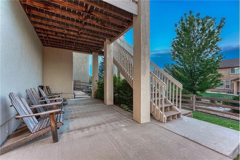 Partial covered back patio located off the basement family/rec room.