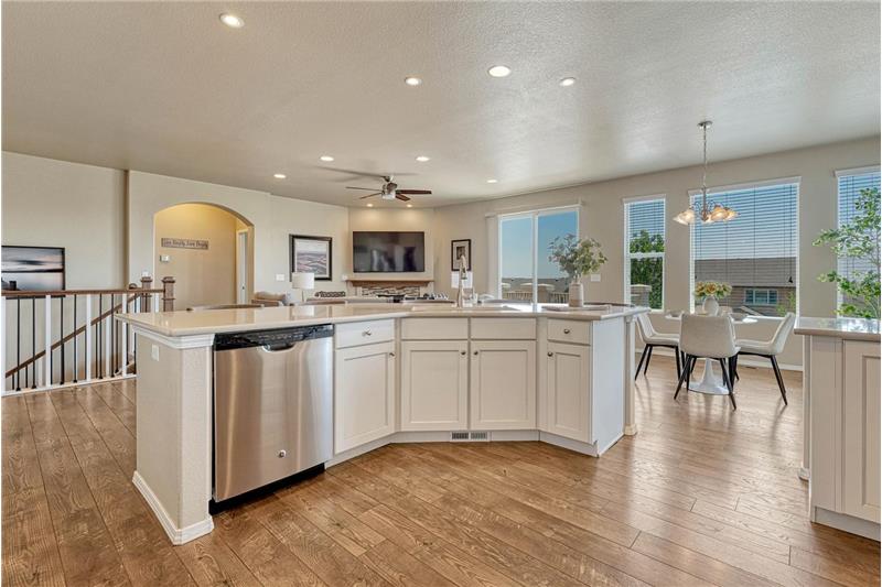 View of the Living Room and Dining Area from the Kitchen.