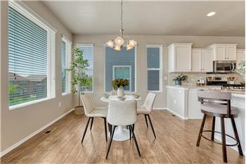 The Dining Area is located off the Kitchen making it easy for food service and clean up.