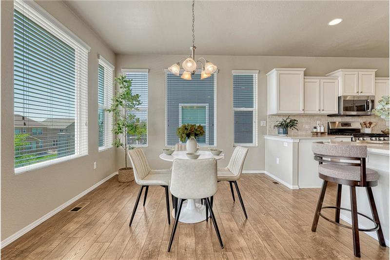 The Dining Area is located off the Kitchen making it easy for food service and clean up.