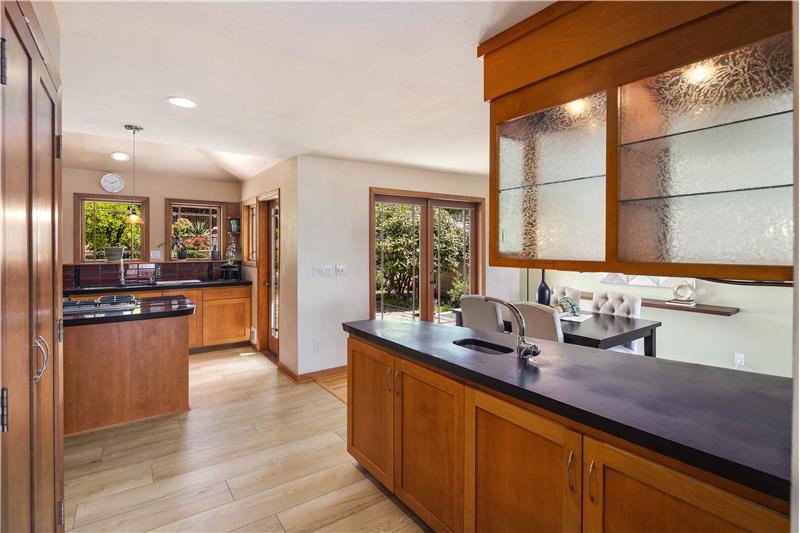 View from wet bar into kitchen.