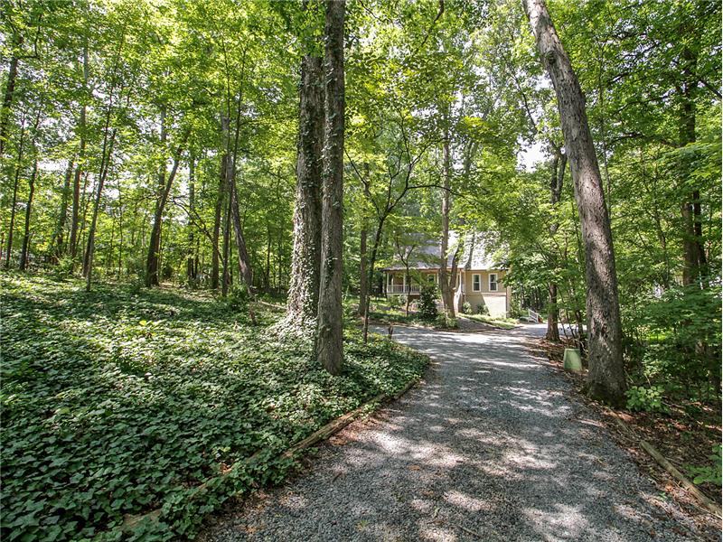.85 acres of wooded privacy