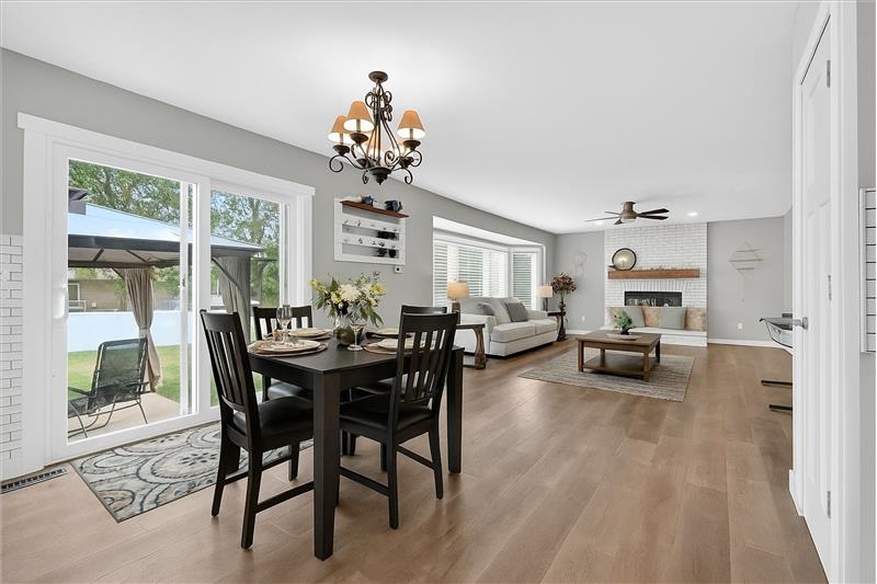 Virtually staged breakfast room to great room
