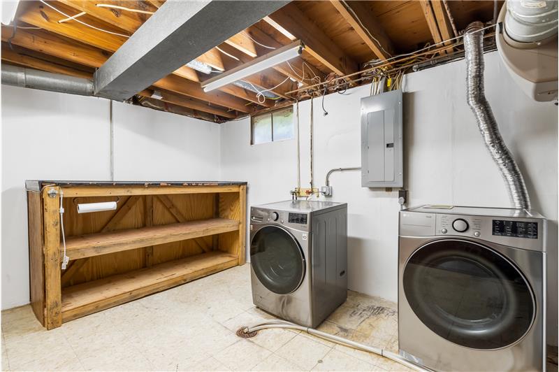 Laundry room, furnace room and storage. Washer & dryer included