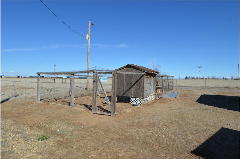 Chicken coop with wired in area to keep the predators out