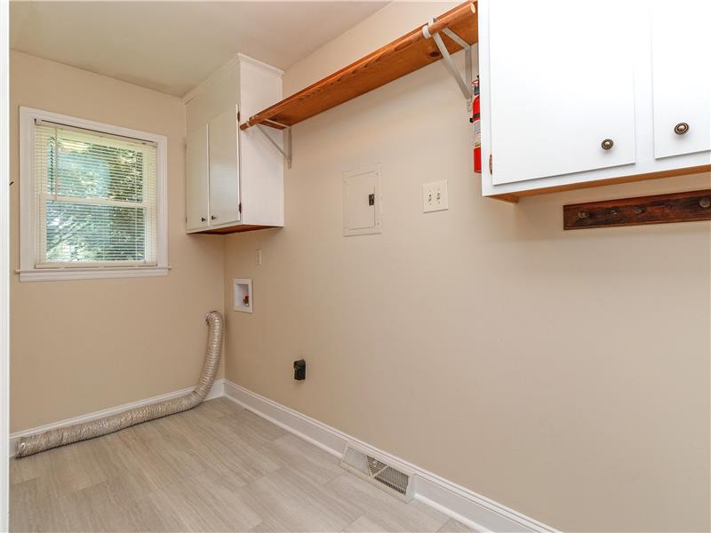 Big laundry room with storage