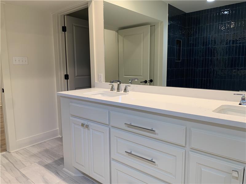 Double vanities/quartz counter tops