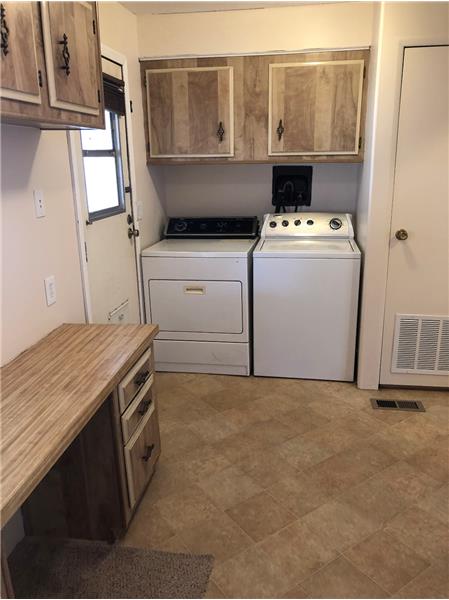Laundry room with washer, dryer & desk 