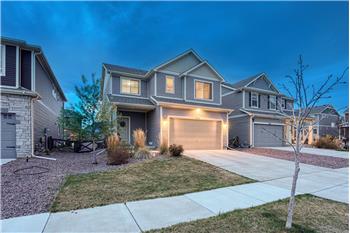 Aerial sunset view of home.