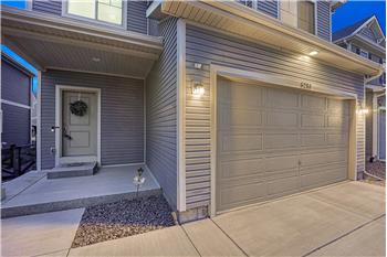 Sunset view of covered front porch.