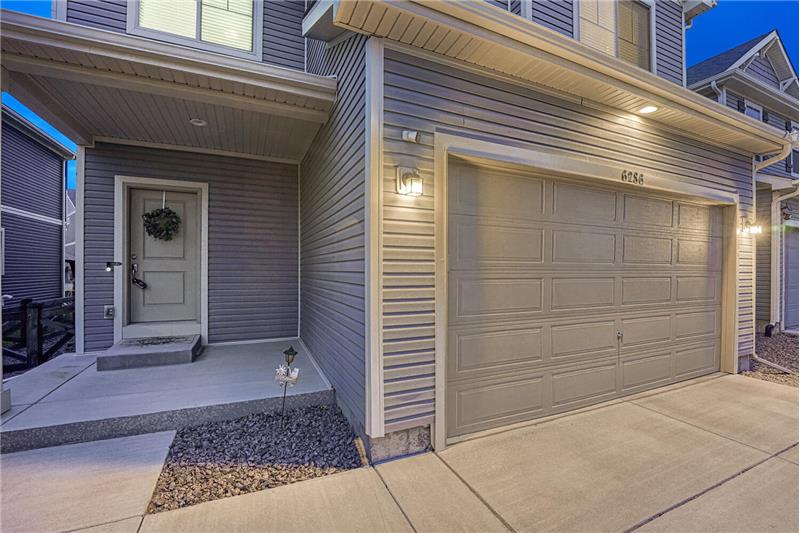 Sunset view of covered front porch.