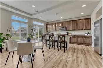 The Dining Area is located adjacent to the Kitchen for easy food serving and clean up.
