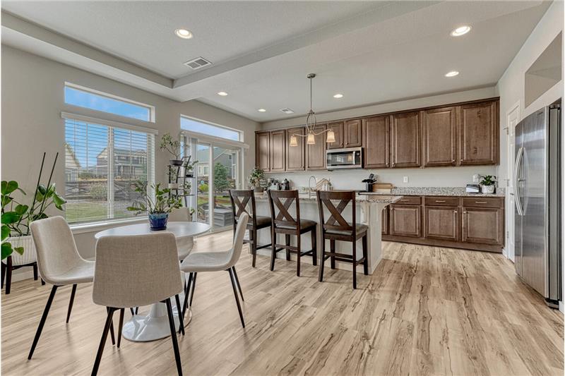 The Dining Area is located adjacent to the Kitchen for easy food serving and clean up.