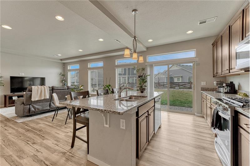 The Kitchen has a slider door out to the backyard.