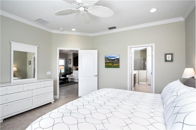 Large Master Bedroom with crown molding 