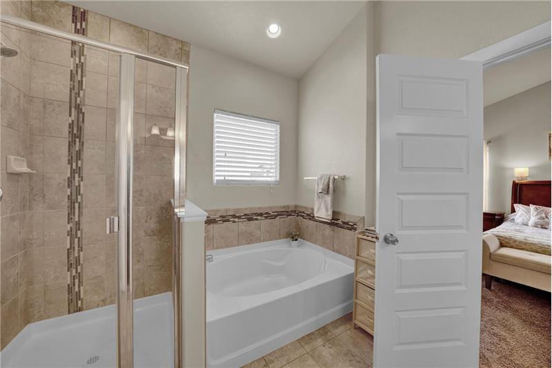 The Master Bathroom also has a soaking tub and separate shower