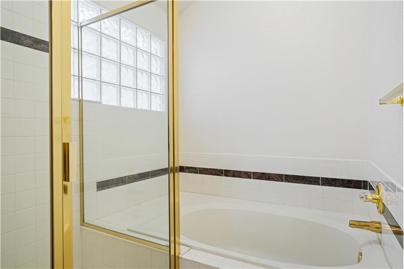 Separate shower and soaking tub 