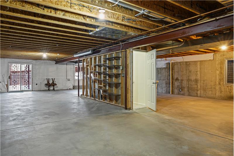 Full unfinished basement was used as a studio by seller