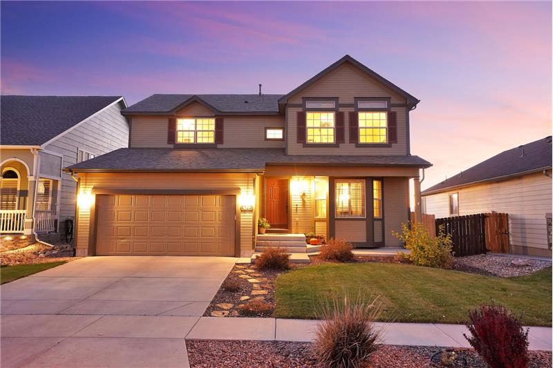 Sunset view of this inviting home with 5 bedrooms and 4 bathrooms located in Indigo Ranch at Stetson Hills