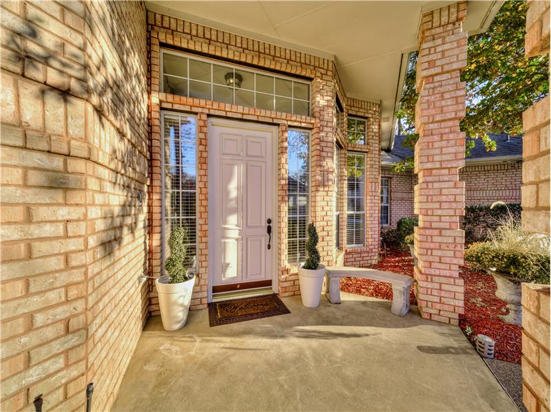 View of the large covered front entrance to property