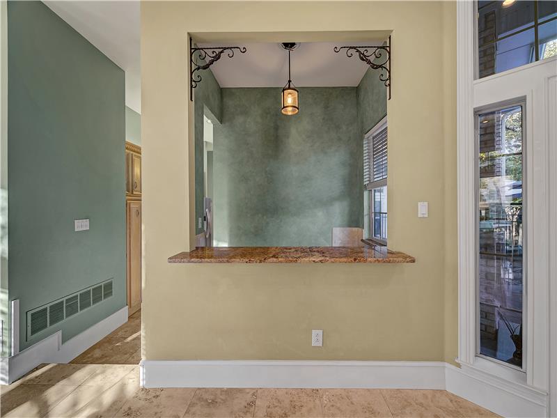 Wet Bar in the front Living room area leading to the kitchen!