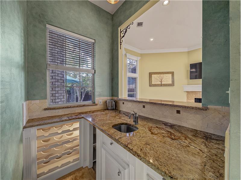 Wet bar with wine storage, sink and granite counters!