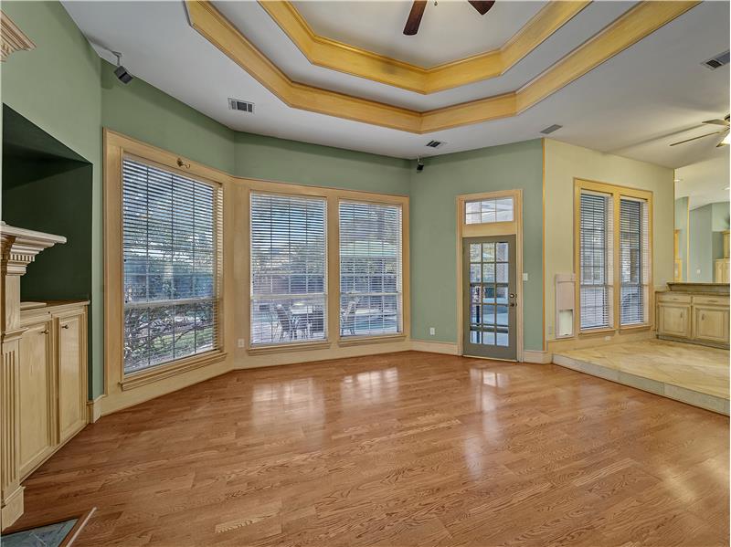 LR - Beautiful hard wood flooring and lots of natural light. Overlooking backyard.