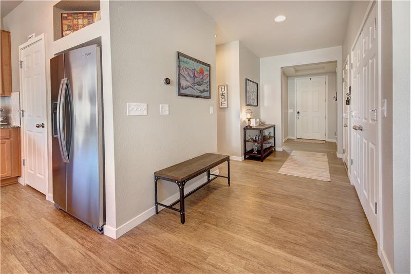 Luxury Vinyl Plank Floors through Entry, Kitchen, Dining Area, and Great Room