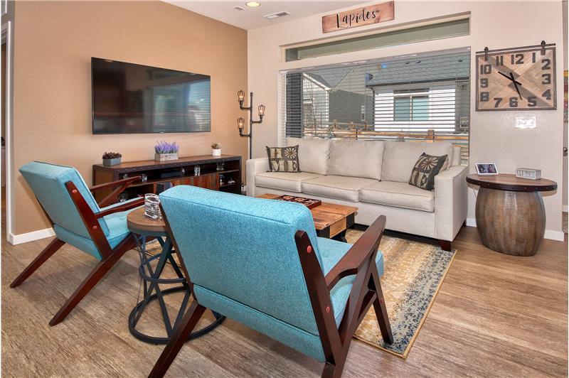 The Great Room is Conveniently Located off the Gourmet Kitchen and Dining Area